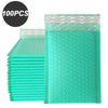 A stack of 100 blue bubble mailers, padded self-seal shipping envelopes.