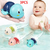 Three colorful swimming turtle bath toys are shown being held and used in water.