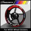 A black motorcycle wheel with red and white stripes, designed for MT-07 wheel stickers.