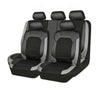 A set of black PU leather car seat covers with breathable mesh for universal fit.