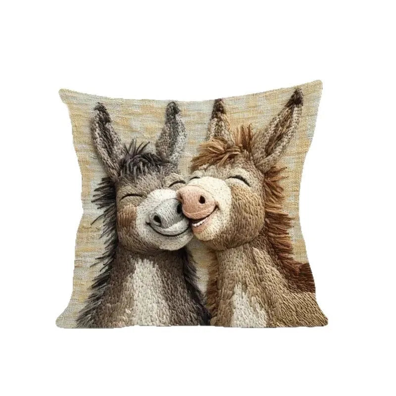 A realistic depiction of two donkey heads resting together on a textured linen-cotton cushion cover.