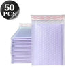 A stack of 50 opaque purple bubble mailers with self-sealing adhesive.