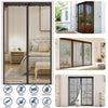 A modern black magnetic screen door curtain with vertical slats and automatic closure, shown in a bedroom setting.