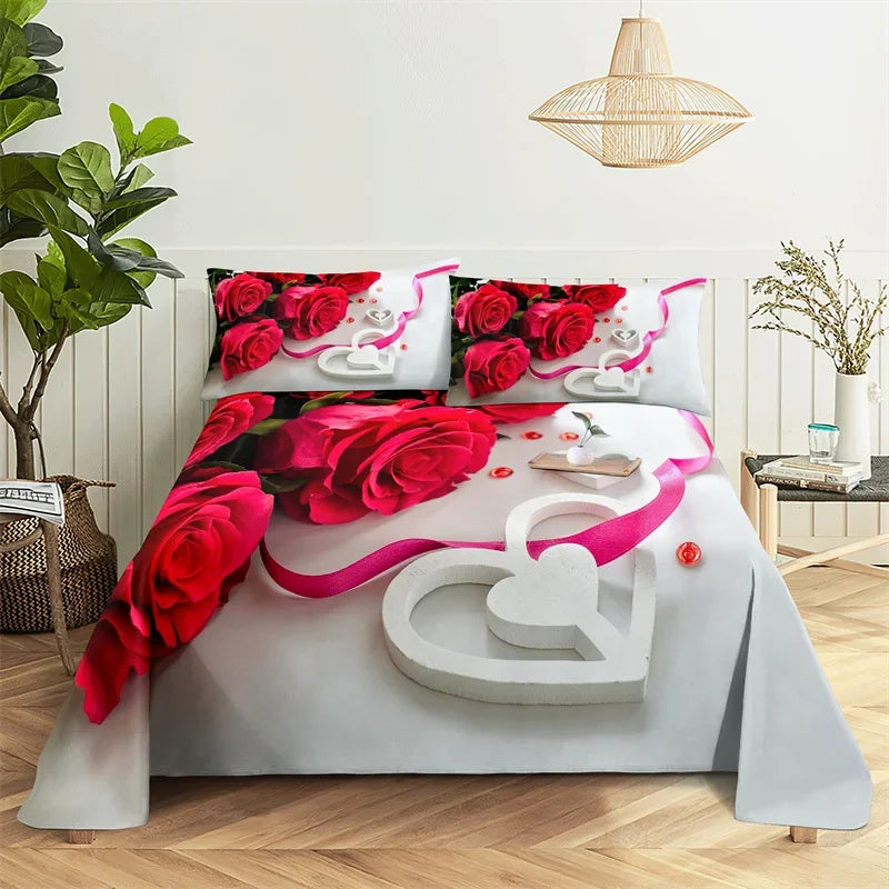 A bed dressed with red rose themed bedding featuring floral prints and white accents.