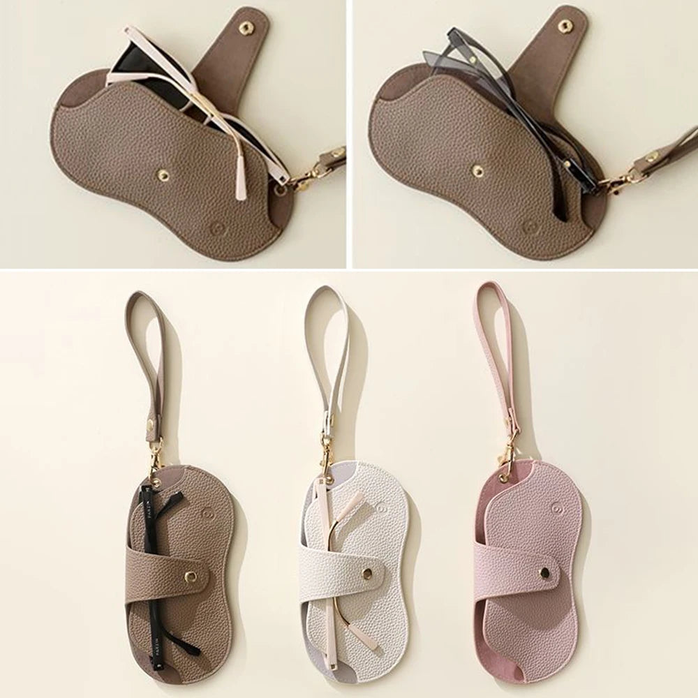 A set of three retro lychee pattern PU leather glasses cases in beige and pink shades.