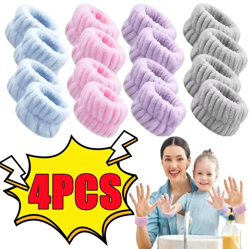 A set of four light blue and pink absorbent microfiber wrist washing bands shown next to a smiling woman and child.