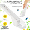 A white handheld insect capture observation tool with a transparent window for viewing insects.