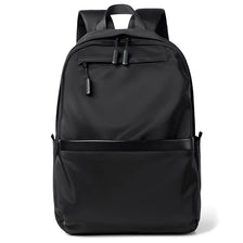 A black large capacity waterproof laptop backpack shown from the front.