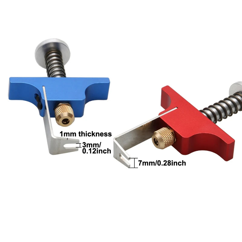 A set of tiny whoop propeller remover tools featuring a blue and red plastic body and a threaded ejector pin.