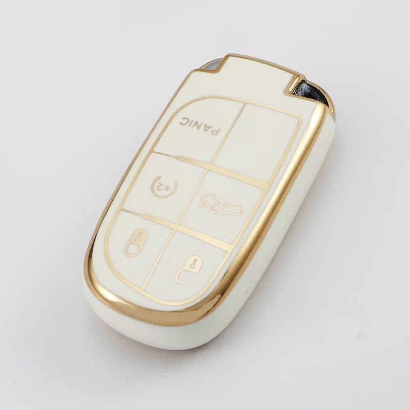 A white and gold durable TPU car key case cover with four labeled buttons.