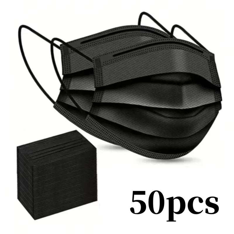 A black disposable face mask is shown with a stack of 50 masks nearby.