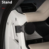 A mobile phone stand is shown mounted in a car interior, featuring a magnetic base and cup holder design.