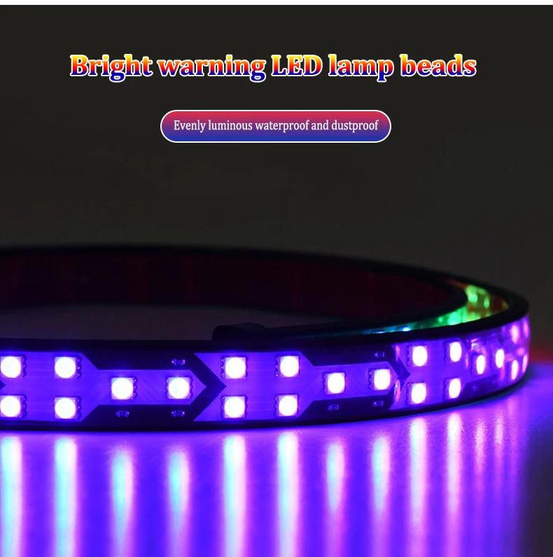 A close-up of an RGB LED lamp bead light bar illuminating a surface with vibrant purple light.