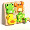 A wooden jigsaw puzzle featuring three animals: a frog, a panda, and a yellow duck.