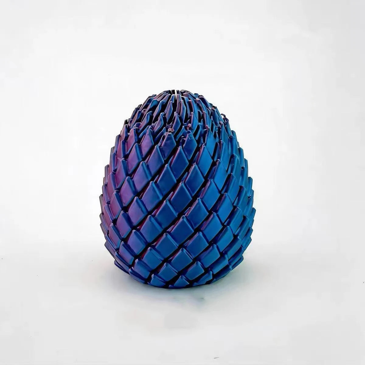 A close-up of a deep blue, textured fidget egg stress relief toy.
