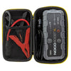 A black travel case containing a NOCO Boost XL jump starter battery and pliers.