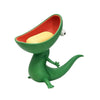 A green lizard-shaped soap holder with an open mouth design and a yellow soap bar inside.