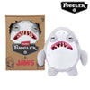 A white plush toy of a monster with large teeth and funny eyes, packaged in a brown box.