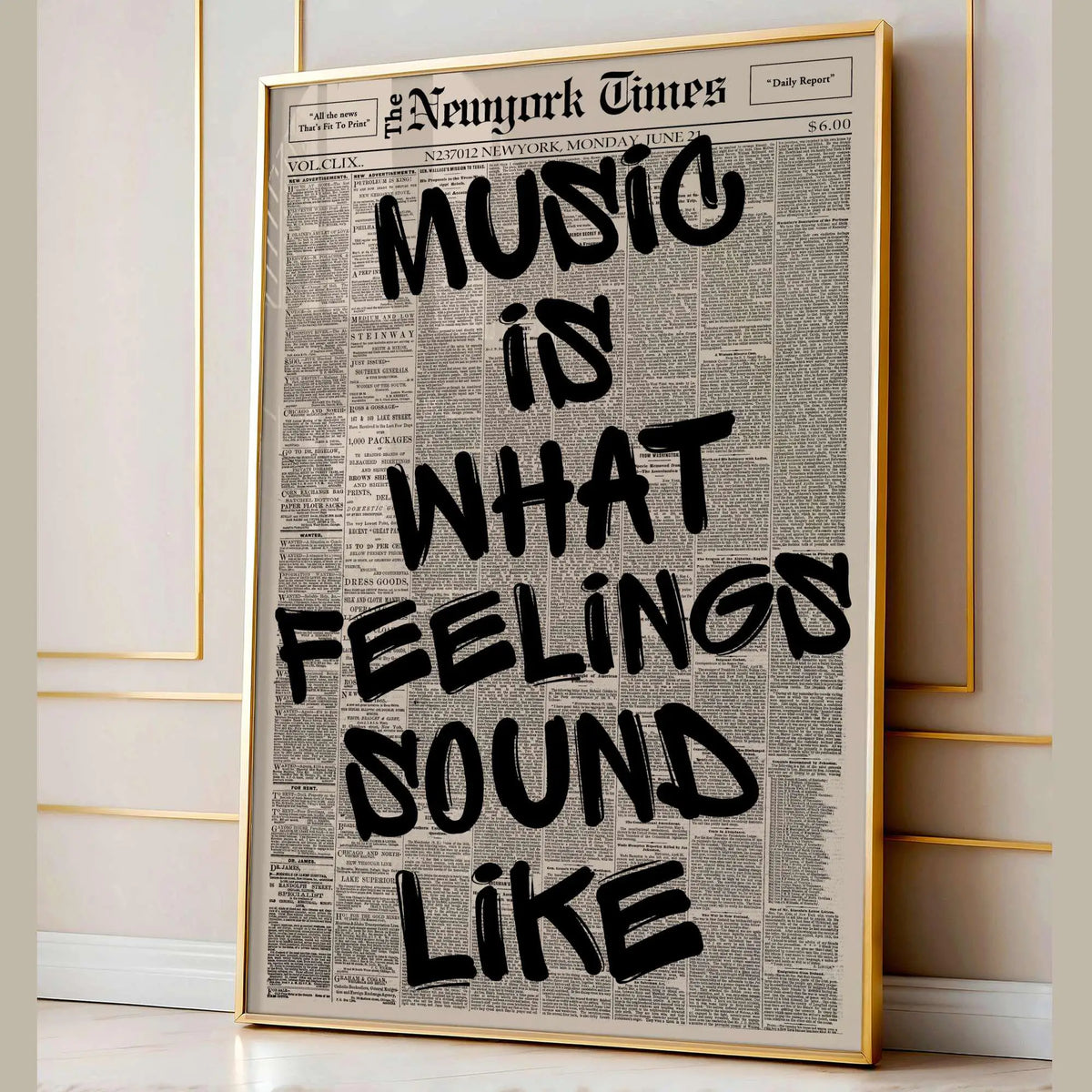 A framed canvas print featuring a newspaper-style quote that reads Music is what feelings sound like.
