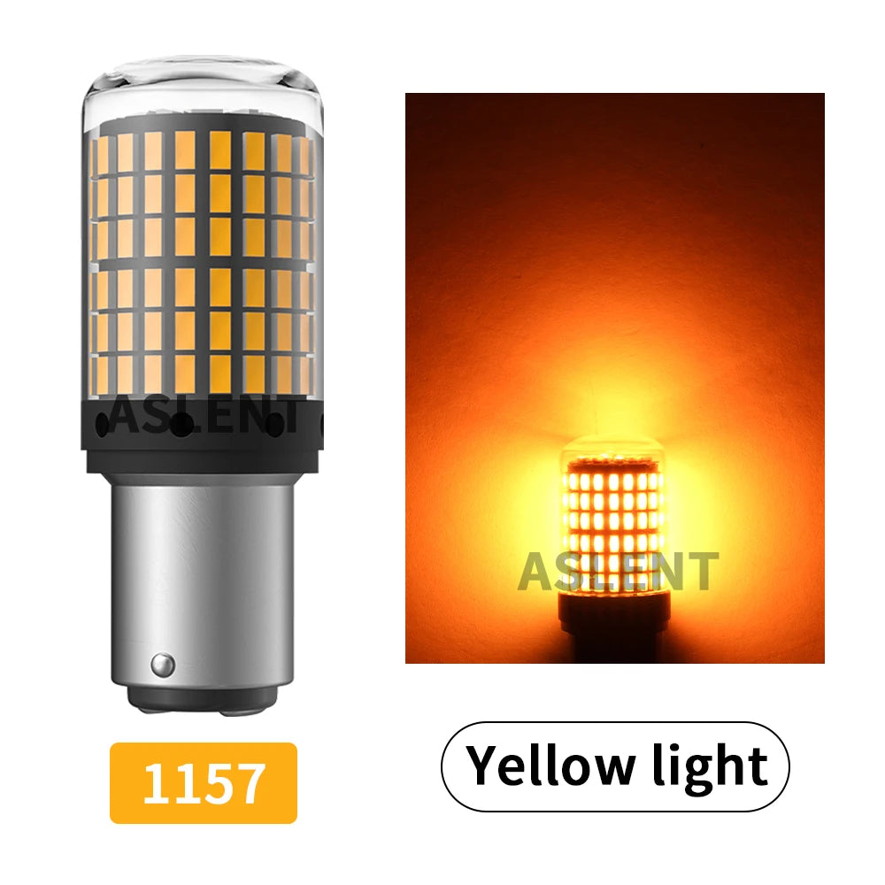 A silver LED bulb with a yellow light emitting from the translucent casing.