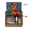 A music box featuring Cardcaptor Sakura characters, including Sakura, with a hand crank mechanism.