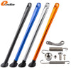 Set of three KTM side stand kits in black, blue, and orange with ABS feet and various hardware components