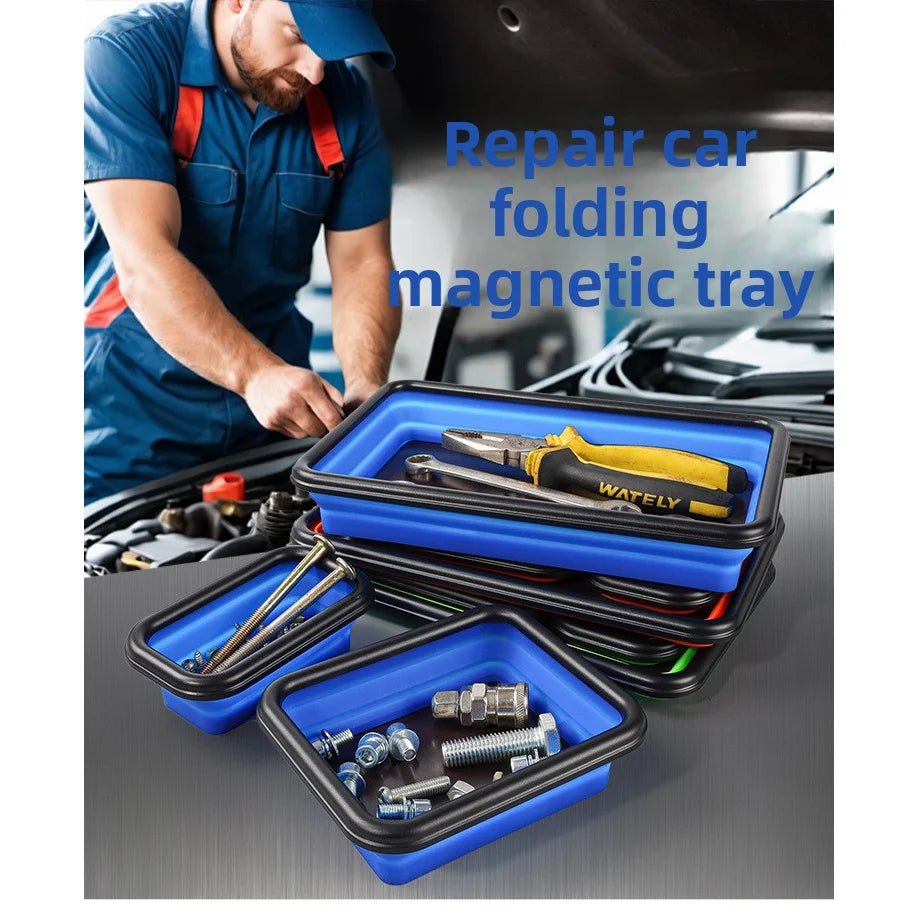 A set of three blue folding magnetic trays containing various car parts and tools.