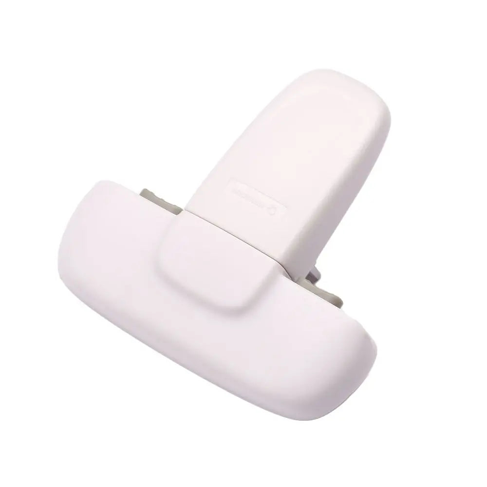A white self-locking refrigerator safety latch designed for toddlers.