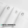 Close-up of a white shower curtain liner featuring metal grommets for easy installation.