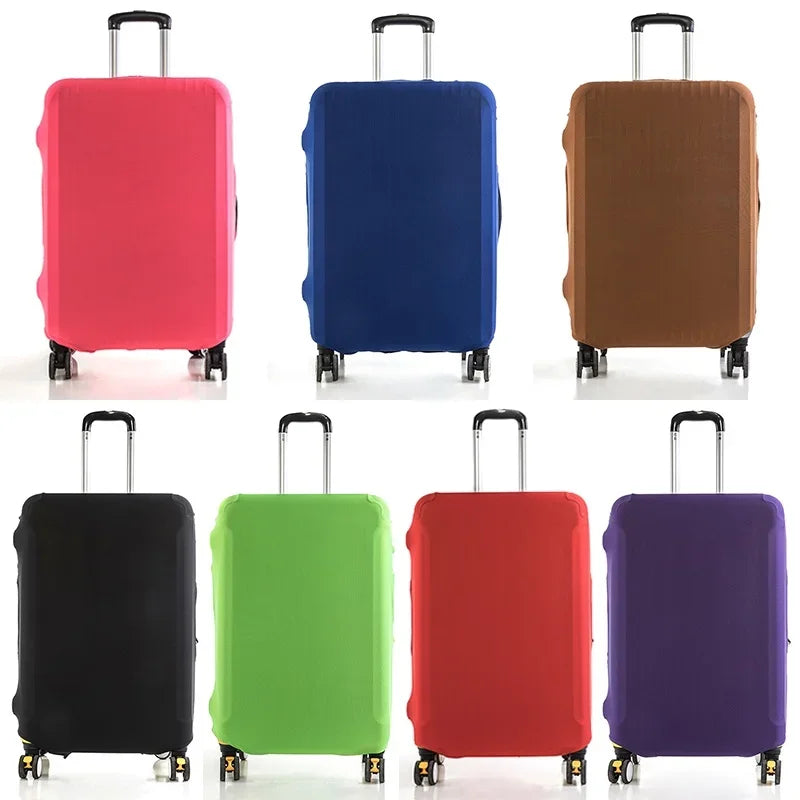 A set of four brightly colored suitcase covers in pink, blue, brown, and purple.