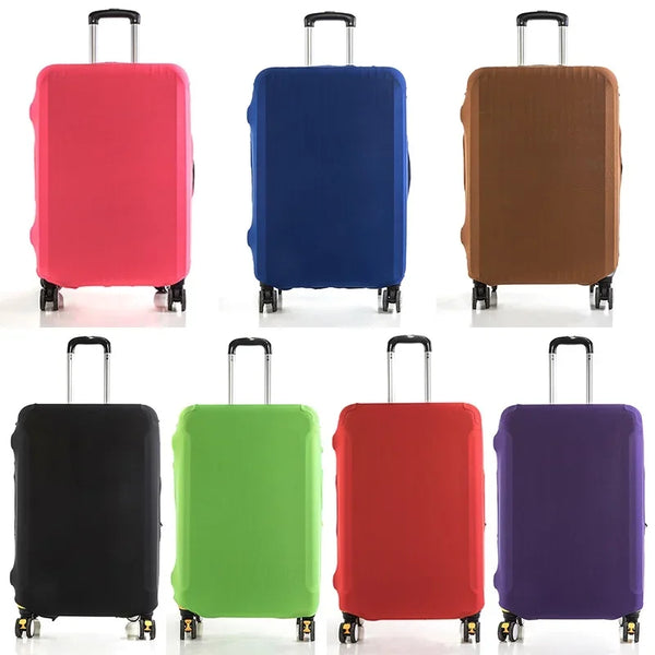 A set of four brightly colored suitcase covers in pink, blue, brown, and purple.