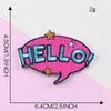Pink embroidered lettering patch shaped like a speech bubble with the word HELLO in blue and gold stars