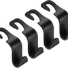 A set of four black car seat headrest hooks for organizing bags and belongings.