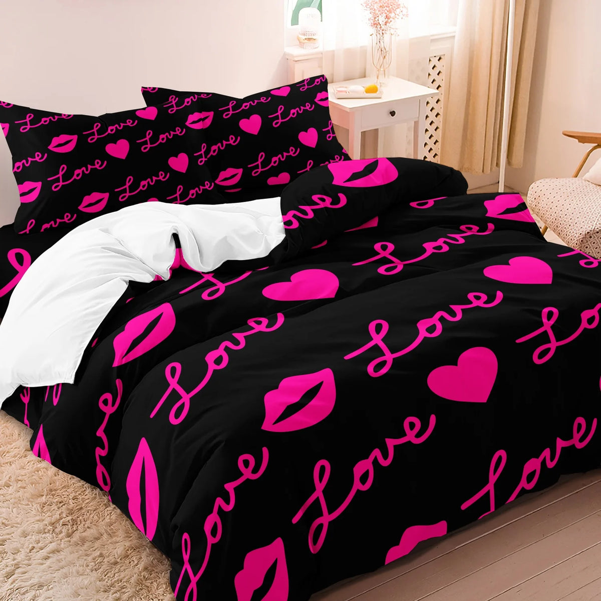 Black duvet cover featuring a vibrant pink lips and heart pattern.