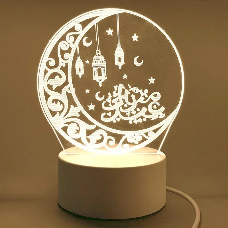 A white acrylic LED night light shaped like a crescent moon with Islamic calligraphy and stars.