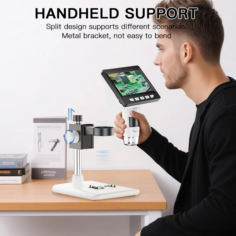 A man is holding a handheld split design digital microscope with a metal bracket for inspection.