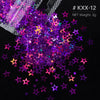 A pile of iridescent purple and pink holographic star sequins is shown against a black background.