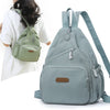 A light blue waterproof nylon crossbody sling bag is shown next to a woman holding a similar green version.