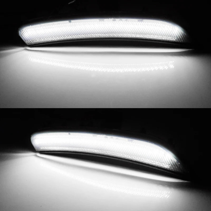 Close-up view of smoked LED side marker lights installed on a vehicle, showing the bright light output.