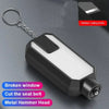 A black emergency car safety hammer with a hidden cutting knife and metal hammer head resting on a dark surface.