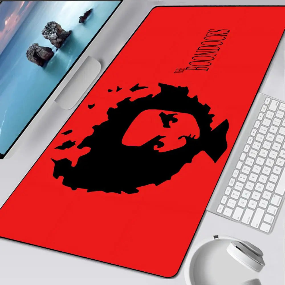A red gaming mouse pad featuring a black silhouette of a skull and crossbones design.