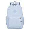 Light blue urban nylon backpack with gray accents and multiple pockets
