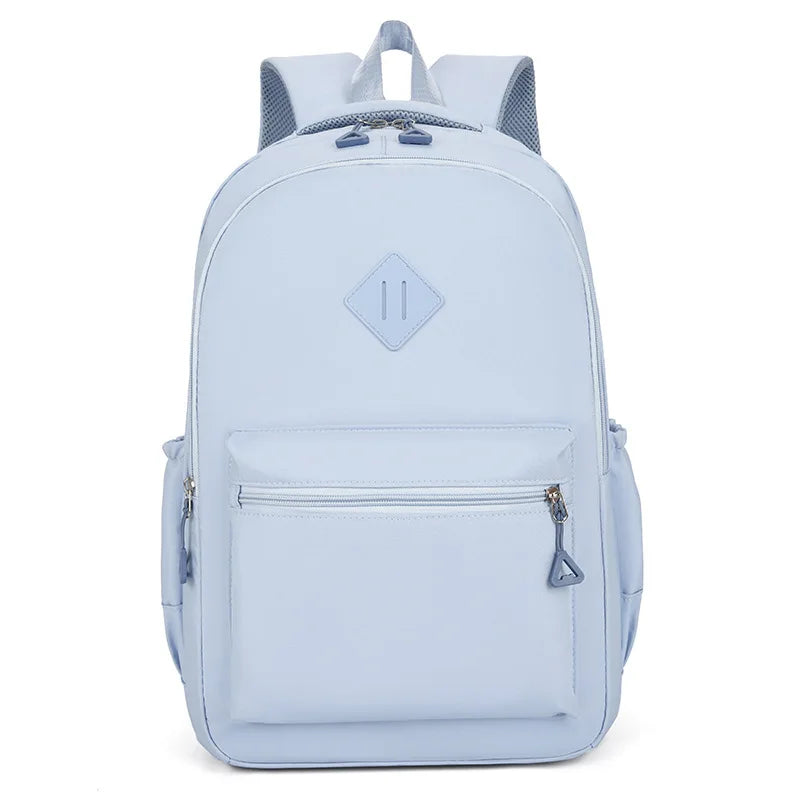 Light blue urban nylon backpack with gray accents and multiple pockets