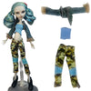 A fashion doll wearing a camouflage outfit with denim accents and a matching accessory.
