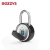 A close-up view of a black fingerprint pad lock with a silver shackle and an electronic keypad.