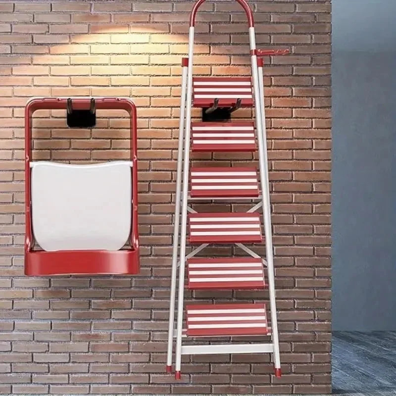 A red and white multi-tiered ladder storage hook mounted on a brick wall.