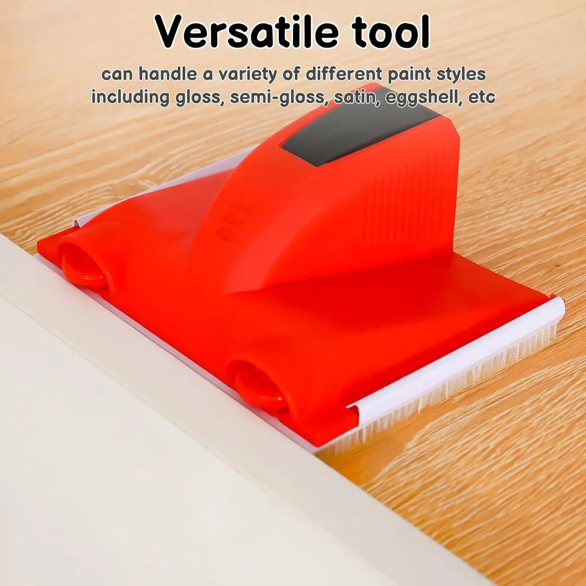 A red paint edger tool with a white brush is shown on a wooden surface, demonstrating its versatility for various paint style
