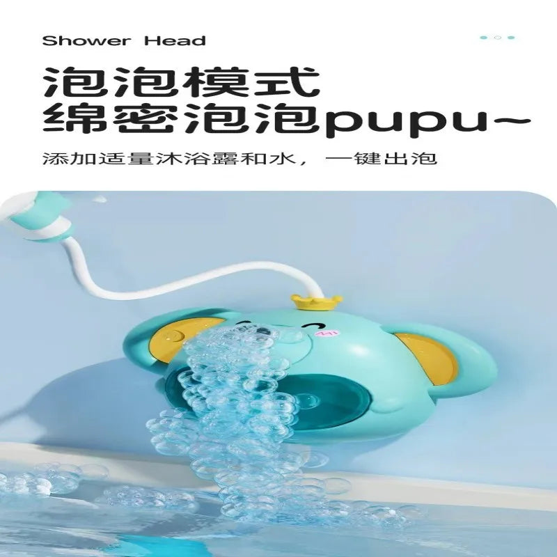 A light blue shower head is spraying water into a bathtub, demonstrating the function of the Pupu elephant bath toy.