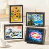 Three framed diamond building blocks featuring Van Gogh's Starry Night and a sunflower painting.