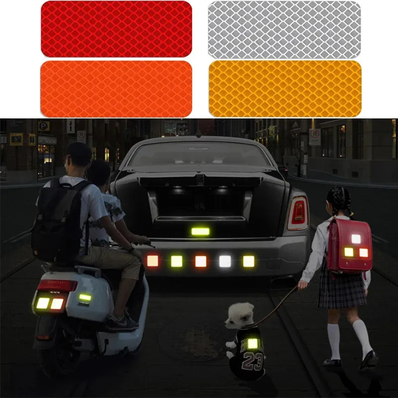 A person is riding a scooter with a reflective strip attached to the rear, near a dark car.